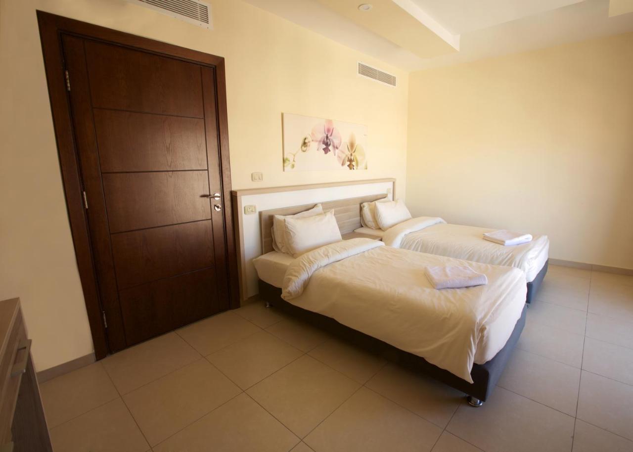Lujain Hotel فندق النور واللجين Амман Номер фото